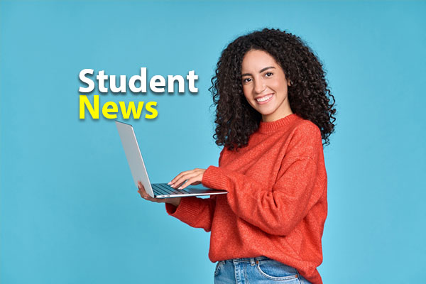 A happy student holding a laptop and looking at the 'Student News' section on the screen.